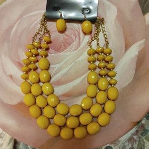 New with tags triple strand yellow & goldtone necklace & earrings